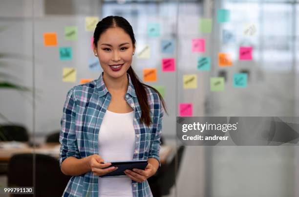 creative woman brainstorming at the office - andresr stock pictures, royalty-free photos & images