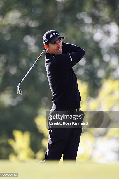 Padraig Harrington of Ireland plays a shot during the Pro-Am round prior to the BMW PGA Championship on the West Course at Wentworth on May 19, 2010...