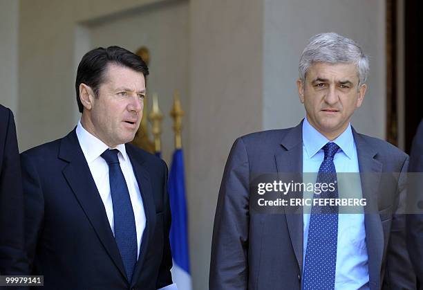 French Industry minister Christian Estrosi and French Defence minister Herve Morin leave the Elysee Palace following the weekly cabinet meeting on...