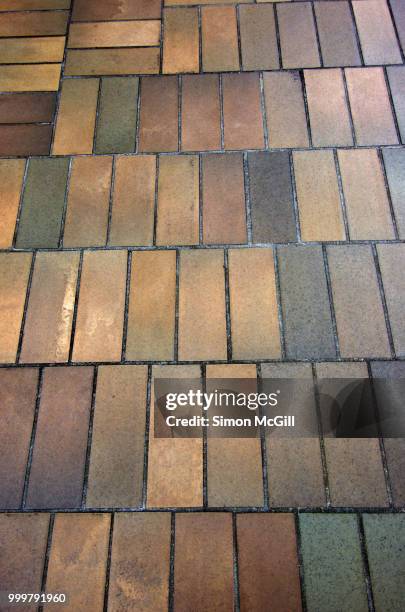 brown and orange brick paving - australian capital territory stock pictures, royalty-free photos & images