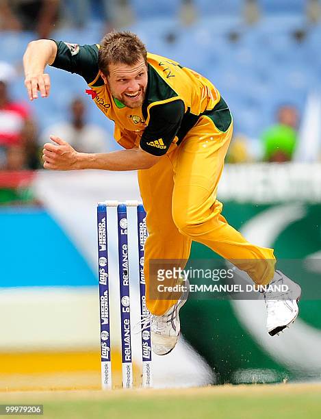 Australian bowler Dirk Nannes delivers a maiden over in the first over during the ICC World Twenty20 second semifinal match between Australia and...