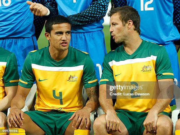 Lucas Neill and Tim Cahill of the Socceroos pose for a photo before an Australian Socceroos training session at AAMI Park on May 19, 2010 in...