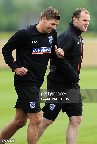 England footballers Steven gerrard and Wayne Rooney take part in a training session in Irdning, Austria on May 19, 2010 ahead of the World Cup Finals...