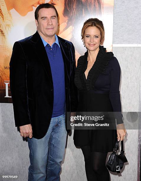 John Travolta and Kelly Preston attends the "The Last Song" Los Angeles Premiere at ArcLight Hollywood on March 25, 2010 in Hollywood, California.