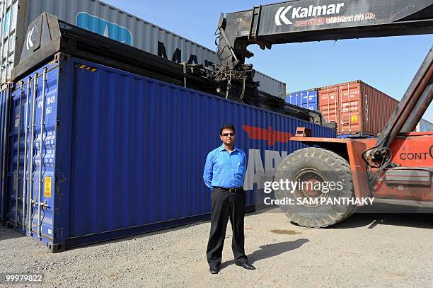 Ruchir Parekh, Managing Director of The Thar Dry Port, poses at Inland Container Depot in Sanand, some 30 kms from Ahmedabad, on May 19, 2010. The...