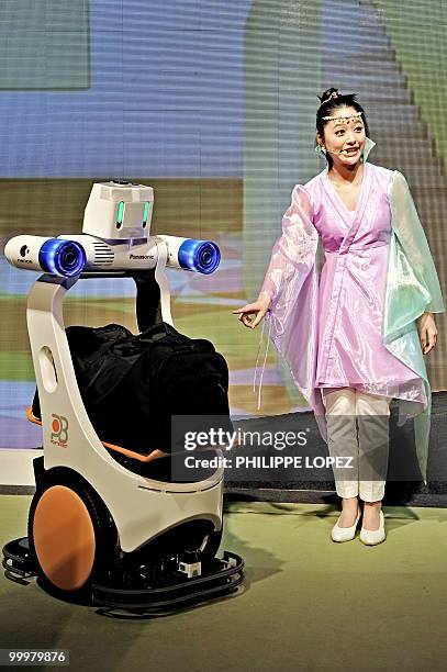 Robot carries a bag during a show titled "better living with robots"at the Japanese pavilion at the site of the World Expo 2010 in Shanghai on May...