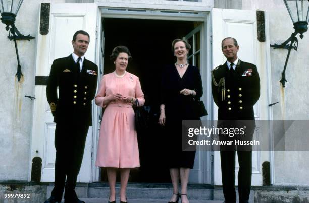 Queen Elizabeth ll and Prince Philip, Duke of Edinburgh pose with Queen Margarthe and Prince Henrik of Denmark during a visit to Denmark in May 1979...