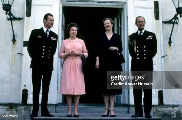 Queen Elizabeth ll and Prince Philip, Duke of Edinburgh pose with Queen Margarthe and Prince Henrik of Denmark during a visit to Denmark in May 1979...