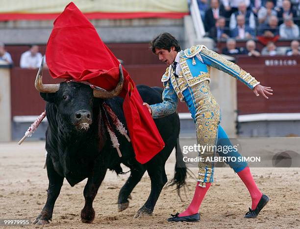 French matador Sebastian Castella makes a pass on a bull at Las Ventas bullring during the San Isidro Feria in Madrid on May 18, 2010. AFP PHOTO /...