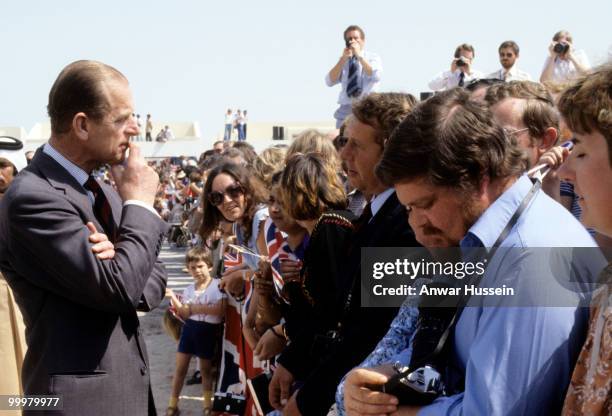 Prince Philip, Duke of Edinburgh meets wellwishers during a visit to Kuwait in February 1979 in Kuwait.