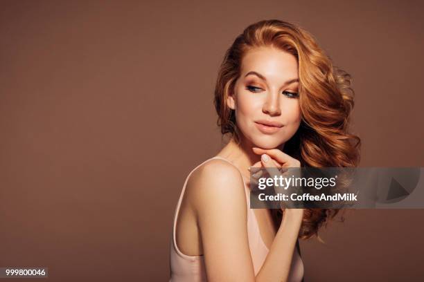 studio shot of young beautiful woman - coffeeandmilk stock pictures, royalty-free photos & images