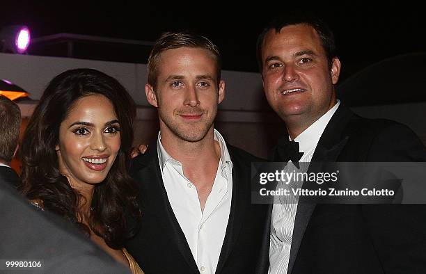 Mallika Sherawat, Ryan Gosling and Jamie Patricof attend Belstaff Hosts 'Blue Valentine' After-Party at Palais Stephanie during the 63rd Annual...