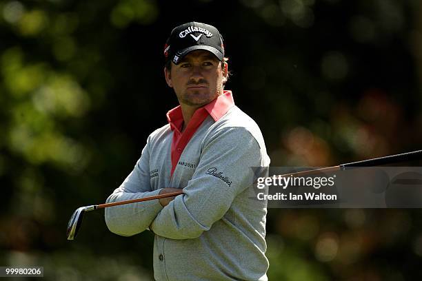 Graeme McDowell of Northern Ireland looks on during the Pro-Am round prior to the BMW PGA Championship on the West Course at Wentworth on May 19,...