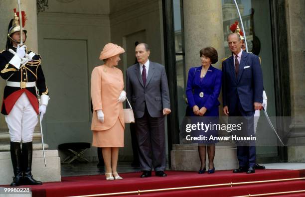 Queen Elizabeth ll and Prince Philip, Duke of Edinburgh pose with President and Madame Mitterand on June 9, 1992 in Paris, France.
