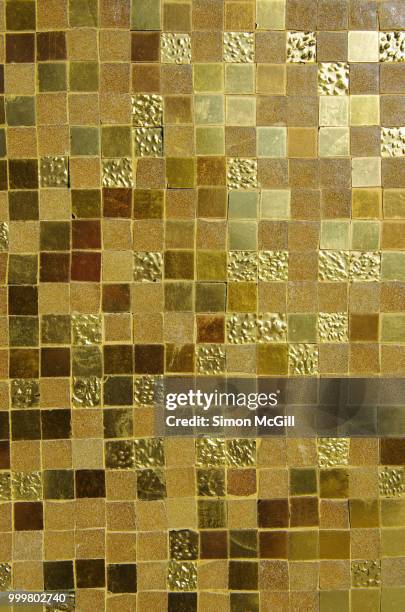 shiny gold tile mosaic on an exterior wall - オーストラリア首都特別地域 ストックフォトと画像