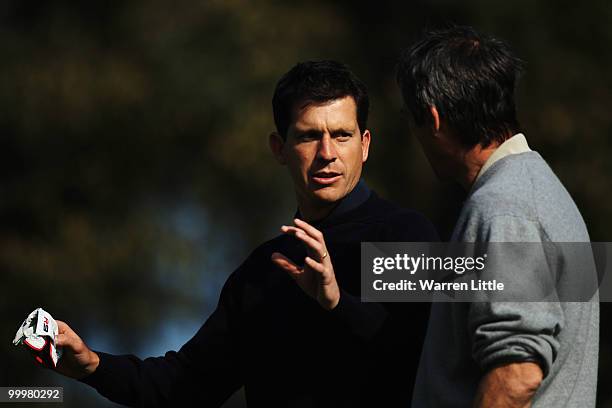 Commentator Alan Hansen talks with playing partner, former tennis player Tim Henman during the Pro-Am round prior to the BMW PGA Championship on the...