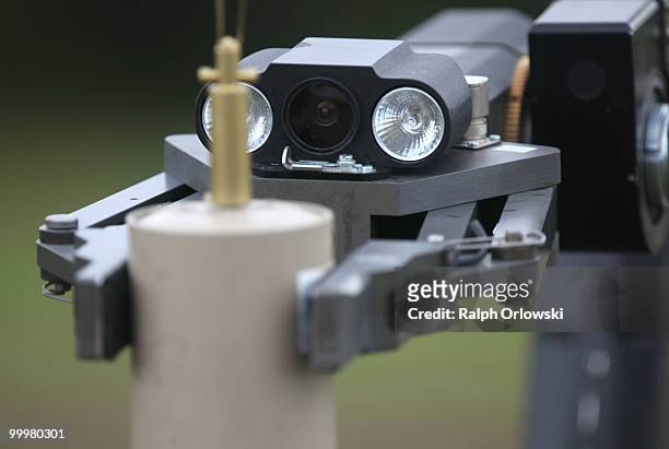 The gripper arm of the ground robot "TEL 620 teodor" of German Telerob company holds a dummy mine during a demonstration at the German army base on...