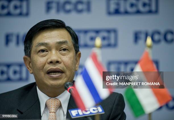 Thailand Deputy Minister of Commerce Alongkorn Ponlabhoot addresses a business meeting at the Federation of Indian Chambers of Commerce and Industry...
