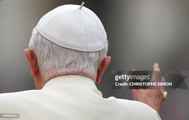 Pope Benedict XVI waves as he arrives for his weekly general audience at St Peter's square on May 19, 2010 at The Vatican. AFP PHOTO / CHRISTOPHE...