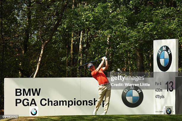 Luke Donald of England tees off at the 13th hole during the Pro-Am round prior to the BMW PGA Championship on the West Course at Wentworth on May 19,...