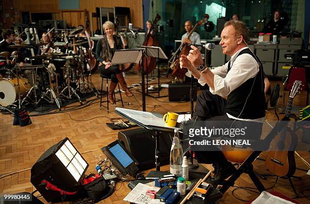 British recording artist Sting rehearses with the Royal Philharmonic Orchestra at Abbey Road Studios in west London on May 19, 2010 as he releases...