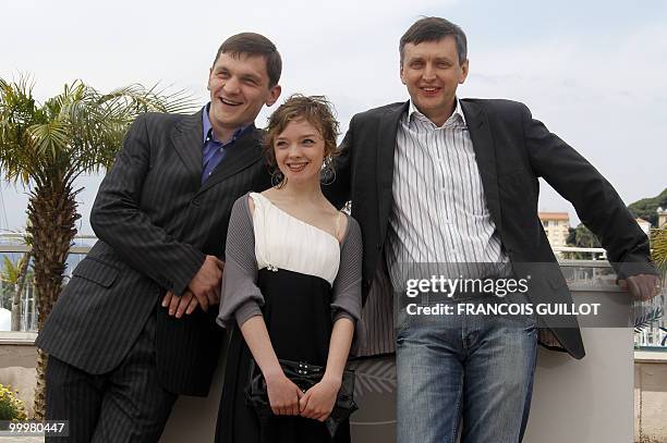 Actor Viktor Nemets, actress Olga Shuvalova and Belarusian born director Sergei Loznitsa pose during the photocall of "Schastye Moe" presented in...