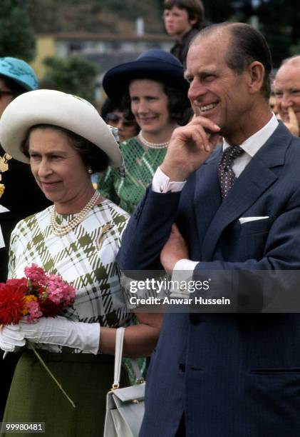 Queen Elizabeth ll and Prince Philip, Duke of Edinburgh smile during the Queen's Silver Jubilee Tour in February, 1977 in Wellington, New Zealand.