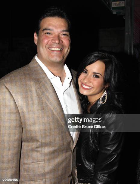 Eddie DeLaGarza and daughter Demi Lovato pose backstage after a performance of "In The Heights" on Broadway at Richard Rodgers Theatre on May 18,...