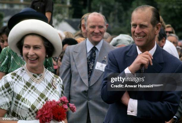 Queen Elizabeth ll and Prince Philip, Duke of Edinburgh smile during the Queen's Silver Jubilee Tour in February, 1977 in Wellington, New Zealand.
