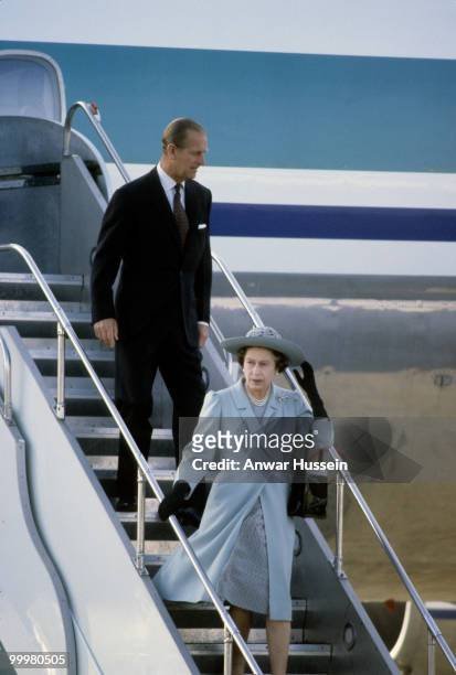 Queen Elizabeth ll and Prince Philip, Duke of Edinburgh arrive by aeroplane for a visit to New Zealand in October 1981 in Wellington, New Zealand.