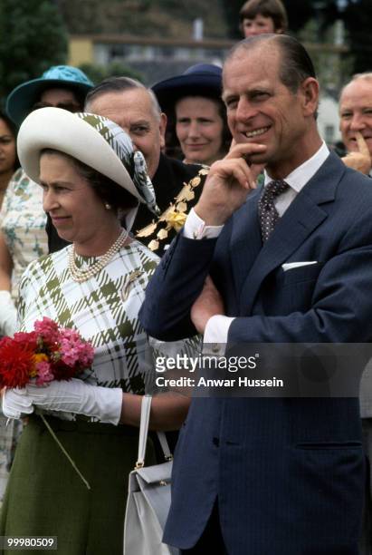 Queen Elizabeth ll and Prince Philip, Duke of Edinburgh smile during the Queen's Silver Jubilee Tour in February, 1977 in Wellington, New Zealand.