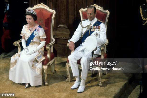 Queen Elizabeth ll and Prince Philip, Duke of Edinburgh attend the State Opening of Parliament during the Queen's Silver Jubilee Tour in February,...