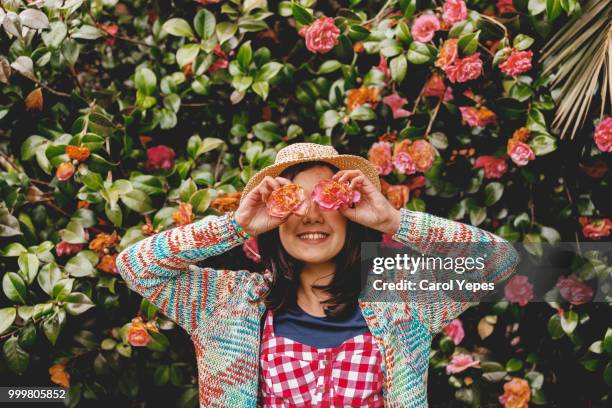 teenager with flowers in front of eyes - ot coruña fotografías e imágenes de stock