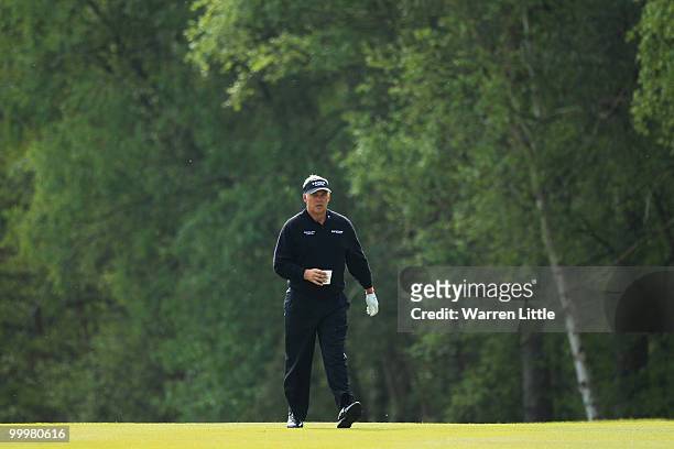 Darren Clarke of Northern Ireland walks up the 9th fairway during the Pro-Am round prior to the BMW PGA Championship on the West Course at Wentworth...