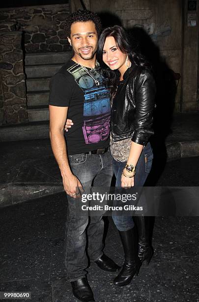 Corbin Bleu and Demi Lovato pose backstage after a performance of "In The Heights" on Broadway at Richard Rodgers Theatre on May 18, 2010 in New York...