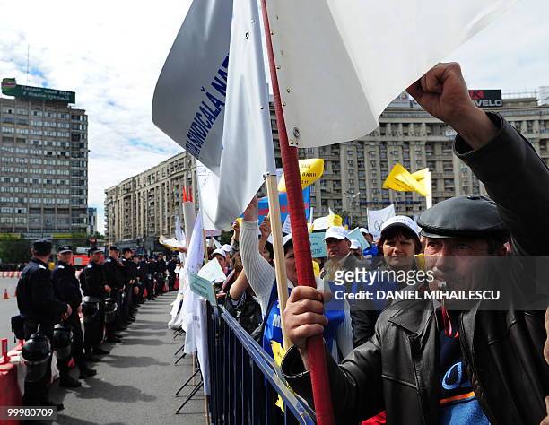 Romanian demonstrators shout anti-governmental slogans during a massive protest in the front of the Romanian Government headquarters in Bucharest on...