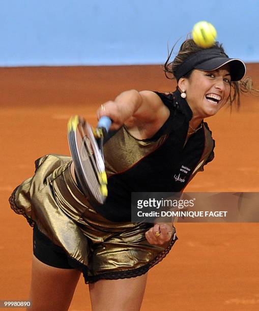 Aravane Rezai of France returns a ball Jelena Jankovic of Serbia during their Madrid Masters tennis match on May 14, 2010 at the Caja Magic sports...