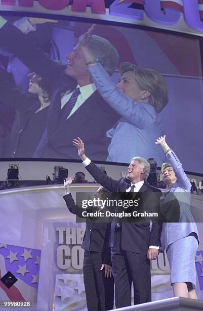 President Bill Clinton and his family at the end of his speech at the Staples Center during the DNC National Convention in Los Angeles California.