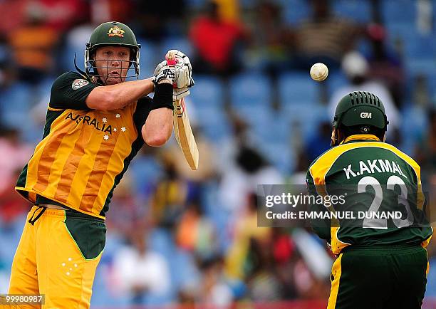 Australian batsman Cameron White is denied a run by Pakistani wicketkeeper Kamran Akmal during the ICC World Twenty20 second semifinal match between...