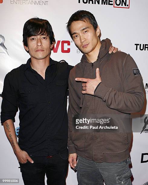 Musician Meegs Rascon & actor Karl Yune arrive at The All-American Rejects world premiere of "Turn Me On 3" at cinespace on May 18, 2010 in...