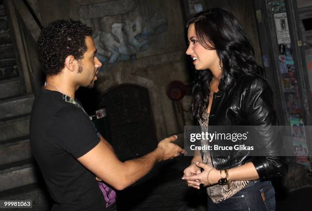 Corbin Bleu and Demi Lovato chat backstage after a performance of "In The Heights" on Broadway at Richard Rodgers Theatre on May 18, 2010 in New York...