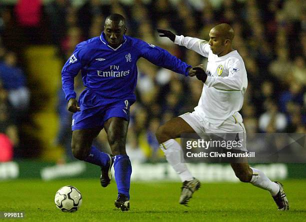 Jimmy Hasselbaink of Chelsea holds off Olivier Dacourt of Leeds during the match between Leeds United and Chelsea in the Worthington Cup Fourth Round...