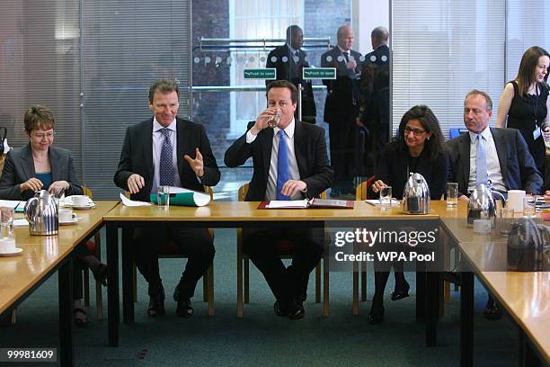 Prime Minister, David Cameron conducts a meeting with Permanent Secretaries from Government departments alongside Cabinet Secretary Sir Gus O'Donnell...