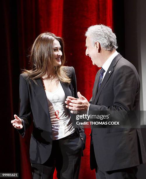 French First Lady and Global Fund's ambassador, Carla Bruni-Sarkozy , chats with the Executive director of the Global Fund, Professor Michel...