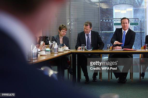 Prime Minister, David Cameron conducts a meeting with Permanent Secretaries from Government departments alongside Cabinet Secretary Sir Gus O'Donnell...