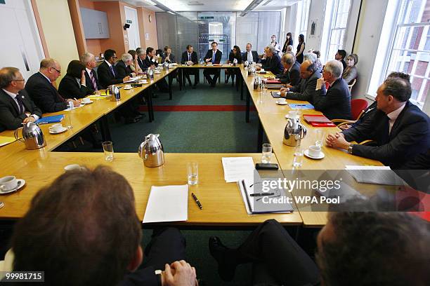 Prime Minister, David Cameron conducts a meeting with Permanent Secretaries from Government departments in Westminster on May 19, 2010 in London,...