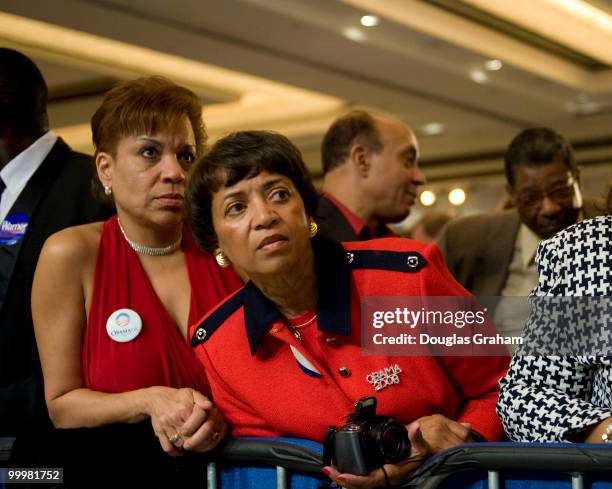 Barbara Heron and Sandra Stiner Lowe watch as results come in at the Hilton McLean Tysons Corner in McLean, Virginia. November 4, 2008.