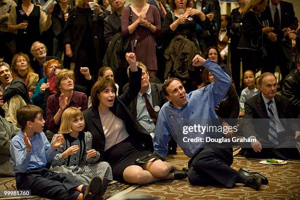 People cheer as results come in at the Hilton McLean Tysons Corner in McLean, Virginia. November 4, 2008.