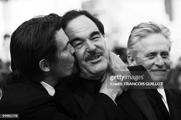 Actor Josh Brolin, US director Oliver Stone and US actor Michael Douglas arrive for the screening of "Wall Street - Money Never Sleeps" presented out...