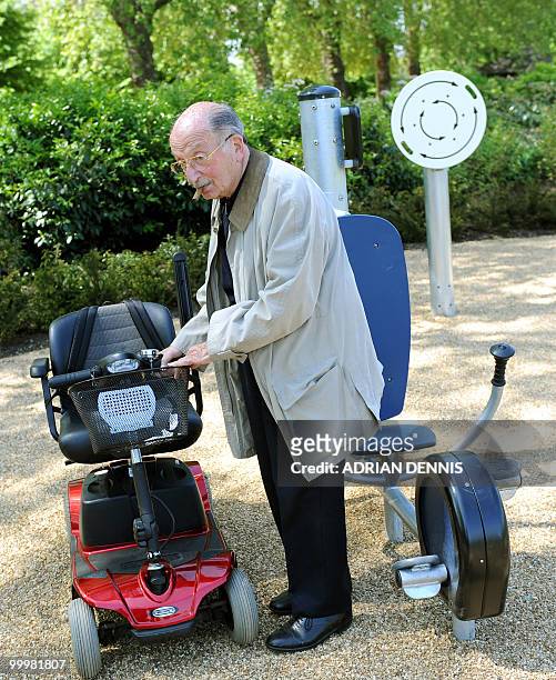 Ronald Woolf, 84 gets back to his mobility scooter after trying a new exercise machine following the official opening of the first pensioners'...